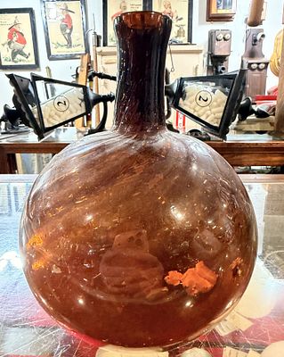 An Antique 19th Century Handblown Amber Glass Fire Bottle. An Antique 19th Century Handblown 