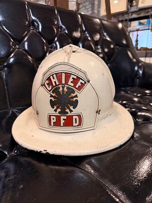 Vintage American Cairns & Brother Leather Chief Firefighter Helmet. A vintage War Baby American 