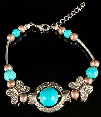 Silver Beaded Bracelet with Faux Turquoise and Butterfly Spacers. Contemporary style costume 
