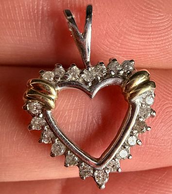Bi-Color 10K Gold Open Heart Pendant with Diamond Accents
Category: Necklaces & Pendants. A 