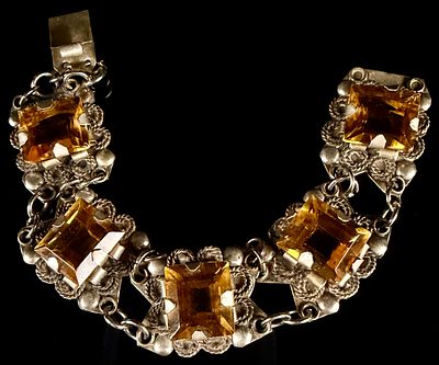 Vintage Mexican Silver Link Bracelet with Rectangular Citrine-Appearing Stones
Category: Bracelets. 
