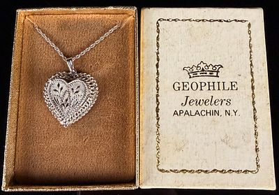 Sterling Silver Engraved Heart Locket Necklace in Original Geophile Jewelers Box
Category: 