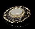 10K Victorian Mourning Style Brooch with Cabochon and Seed Pearls. A single antique or vintage Image - 1