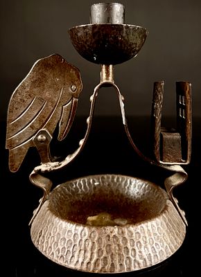 Arts and Crafts Hammered Metal Desk Candlestick with Stylized Bird and Match Holder. A single 