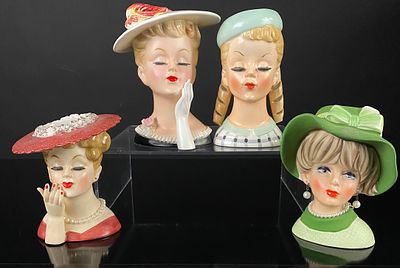 A Collection of 4 Vintage Napco Style Lady Head Vases. A collection of four glazed ceramic lady 