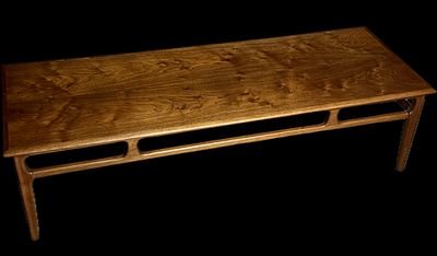 Mid-Century Modern Mersman Cocktail Table. A Mid-Century Modern cocktail table attributed to 