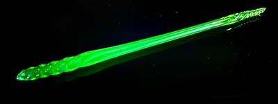 Uranium Glass End of Day Partial Parade Cane Rod. A single, elongated rod fashioned from 