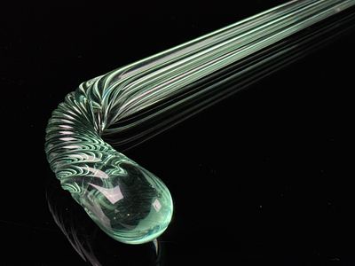 A Pale Green End of Day Glass Parade Cane. A single contemporary or historical glass whimsy cane 