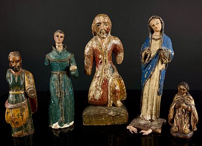 A Collection of Five Spanish Colonial Polychrome Wood Santos Figures. A collection of five 