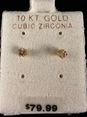 A Pair of 10K Yellow Gold and Cubic Zirconia Stud Earrings. A pair of yellow gold stud earrings 