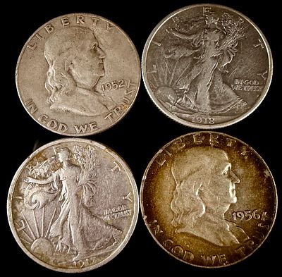 A Group of United States Walking Liberty and Franklin Silver Half Dollars. A group of United 
