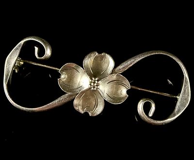 Stuart Nye Sterling Silver Dogwood Blossom Scroll Brooch. This sterling silver brooch by maker 