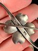 Stuart Nye Sterling Silver Dogwood Blossom Scroll Brooch. This sterling silver brooch by maker Image - 1