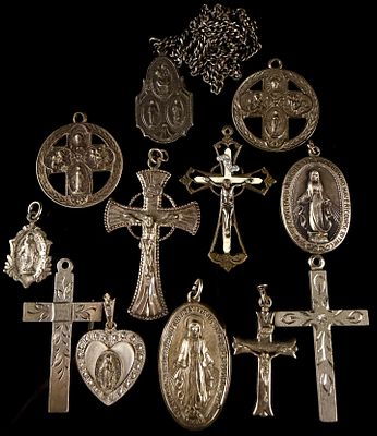 A Collection of Vintage Sterling Silver Religious Medals and Crucifixes. A collection of vintage 