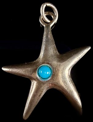 Tiffany & Co. Sterling Silver and Turquoise Starfish Pendant. A Tiffany & Co. starfish pendant 