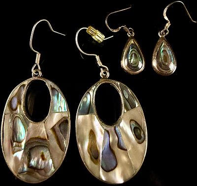 A Group of Mexican Sterling Silver and Abalone Shell Earrings. A group of sterling silver and 