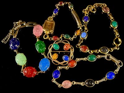 A Collection of 1960s Gold-Filled and Carved Stone Scarab Jewelry. This collection of mid-20th 