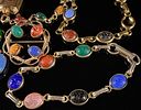A Collection of 1960s Gold-Filled and Carved Stone Scarab Jewelry. This collection of mid-20th Image - 4