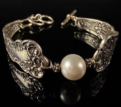 English Lace Silver and White Pearl Spoon Bracelet. This bracelet is constructed from two 