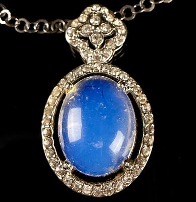 Sterling Silver and Blue Opalescent Cabochon Pendant Necklace. This necklace features a sterling 