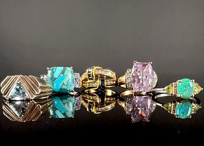 A Collection of Contemporary Sterling Silver and Gilt Metal Fashion Rings. This collection of 