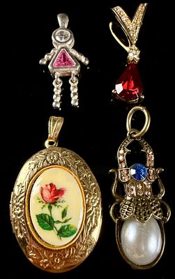 An Assortment of Pendants and Lockets. An assortment of pendants and lockets of various styles 