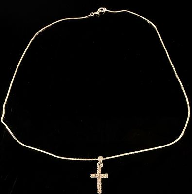 Sterling Silver and Champagne Gemstone Cross Pendant Necklace. A sterling silver necklace 