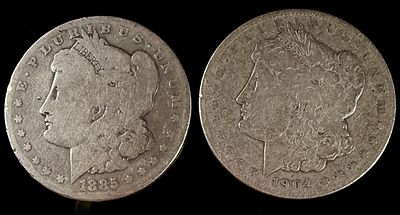 A Pair of US Morgan Silver Dollars 1885-O and 1904-S. A pair of US Morgan silver dollars (KM# 