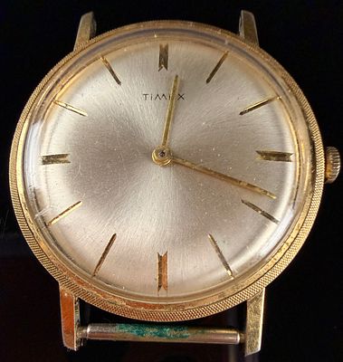 Vintage Timex Wafer Thin Manual Wind Wristwatch. A Timex Wafer Thin wristwatch featuring a 