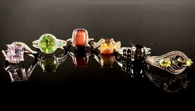 A Collection of Sterling Silver and Multi-Color Gemstone Cocktail Rings. An assortment of 