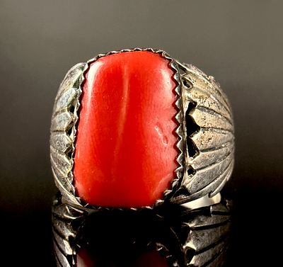 Southwestern Style Red Coral and Silver Toned Metal Saddle Ring. A Southwestern style statement 