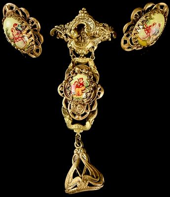 Karu Fifth Avenue Neo-Rococo Style Courting Couple Pendant Brooch and Earring Suite. A costume 