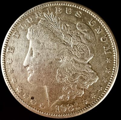 1921 US Morgan Silver Dollar. 1921 US Morgan silver dollar, Philadelphia mint. This coin is 