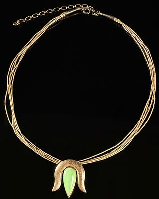 Sterling Silver Multi-Strand Liquid Silver Necklace with Green Gemstone Pendant. It features a 