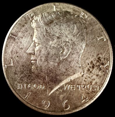 Three US 90% Silver Coins, 1923-1964. Three US silver coins comprising a 1964 Kennedy half 