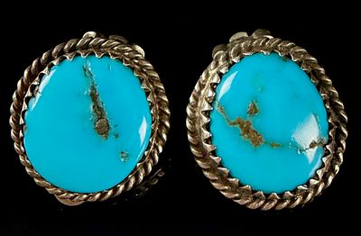 A Pair of Southwestern Style Turquoise and Silver-Colored Metal Clip-On Earrings. This matched 