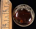 European .835 Silver and Baltic Amber Circular Openwork Brooch. A circular openwork brooch Image - 3