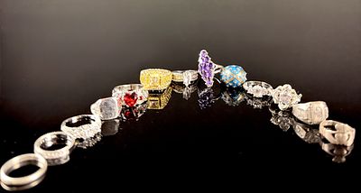 A Collection of Sterling Silver and Fashion Cocktail Rings. This collection features a variety 