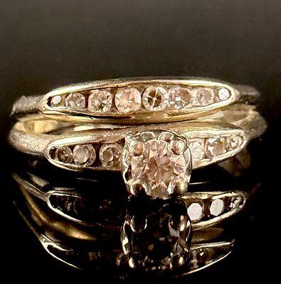 14 Karat Yellow Gold Diamond Bridal Ring Set. A 14 karat yellow gold bridal ring set featuring a 