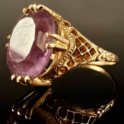 Art Deco Style 14 Karat Yellow Gold Filigree Amethyst Cocktail Ring. This cocktail ring is 