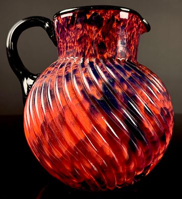 Czechoslovakian Art Deco Spatter Glass Pitcher. A hand-blown Czechoslovakian art glass pitcher 