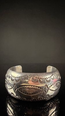 Alice N. Bitsui Navajo Sterling Silver Stamped Cuff Bracelet. A wide sterling silver cuff 