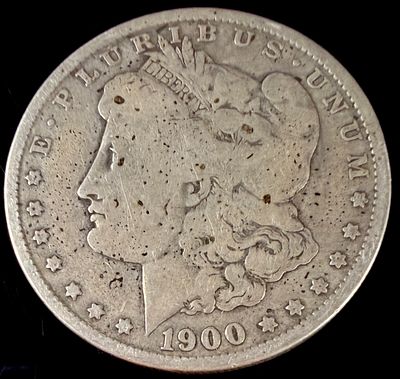 US 1900-O Morgan Silver Dollar. A United States Morgan silver dollar struck at the New Orleans 