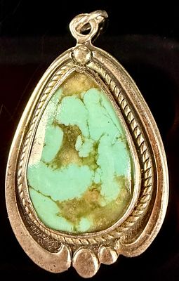 Bell Trading Post Sterling Silver and Green Turquoise Pendant. This teardrop-shaped pendant is a 