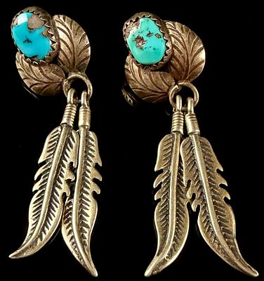 A Pair of Masha Navajo Style Sterling Silver and Turquoise Feather Drop Earrings. This is a 