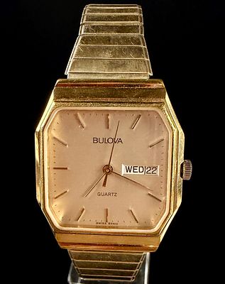 Bulova Vintage Quartz Day-Date Octagonal Wristwatch Reference 83410. A vintage Bulova quartz 