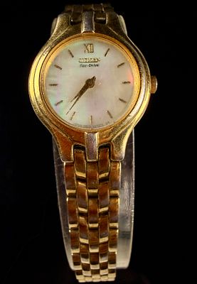 Citizen Eco-Drive Gold Tone Stainless Steel Ladies Wristwatch with Mother of Pearl Dial. A 
