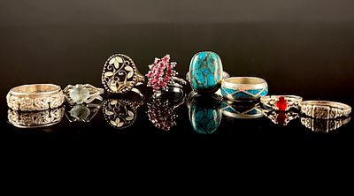 An Assortment of Eight Sterling Silver and Gemstone Rings. This lot consists of eight assorted 