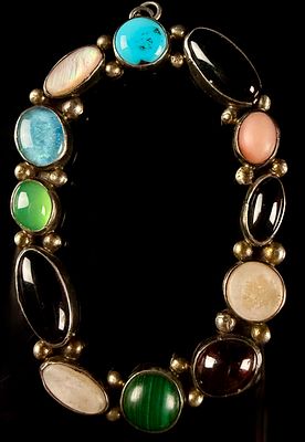 Mexican-Style Silver-Toned and Multi-Stone Oval Pendant. This oval pendant is designed in a 