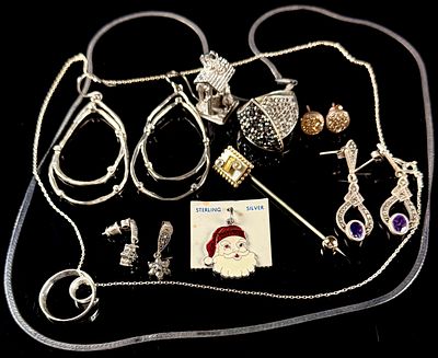 A Collection of Sterling Silver and Fashion Jewelry Including Marcasite and Enameled Items. An 